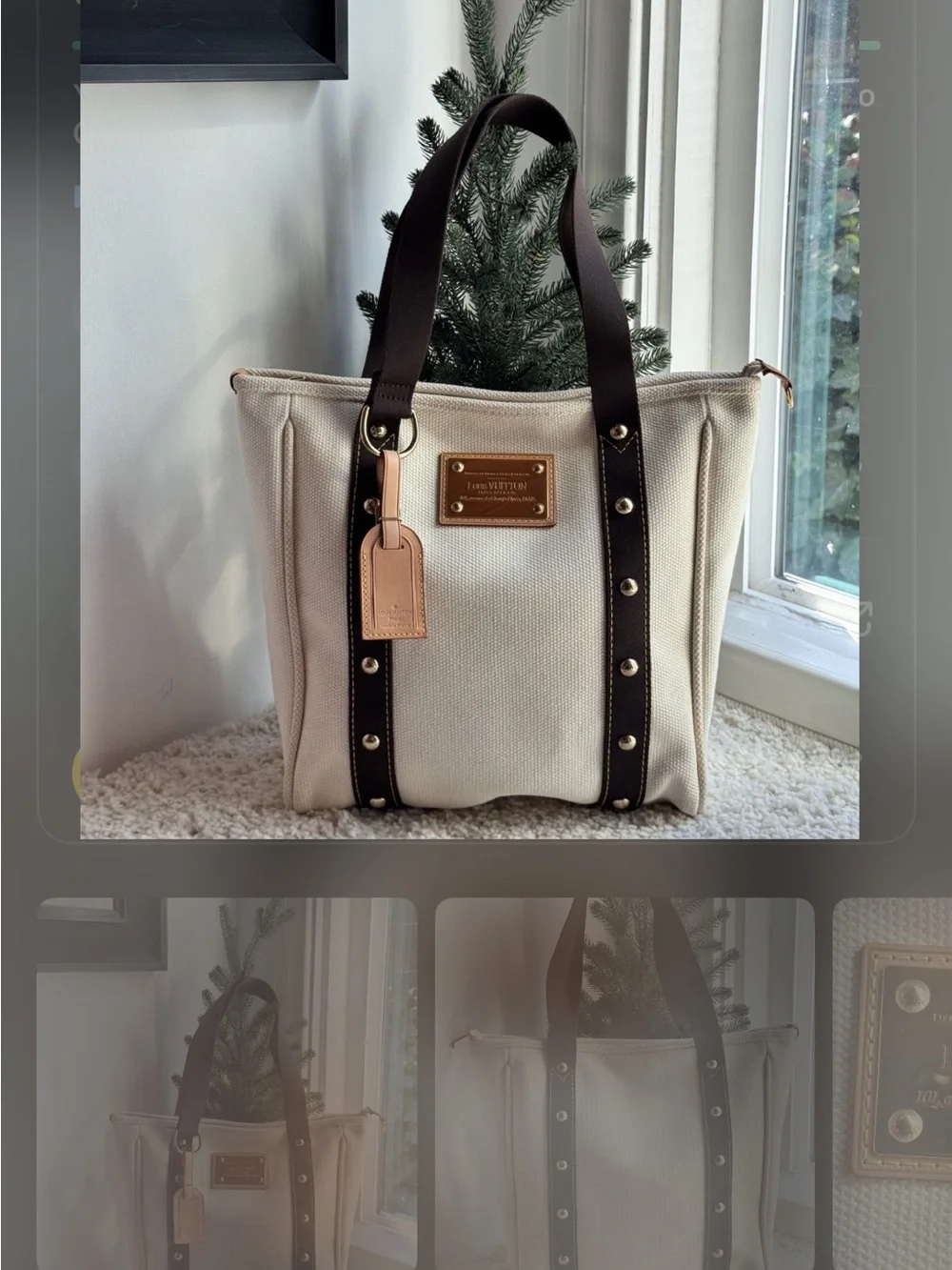 Authentic Louis Vuitton tote in brown leather trim and silver stud w/luggage tag